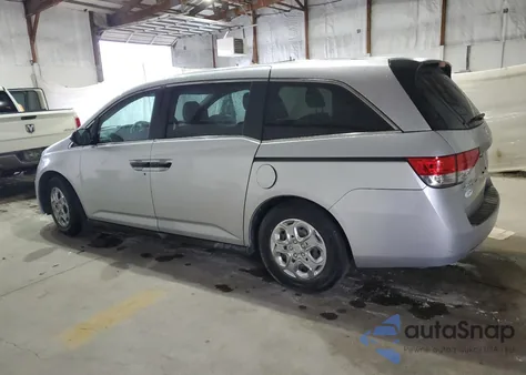 2014 Honda Odyssey Lx z USA, uszkodzony, nr VIN 5FNRL5H24EB045954
